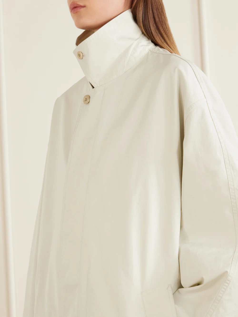 Close-up detail of the Lemaire Cotton-gabardine Coat