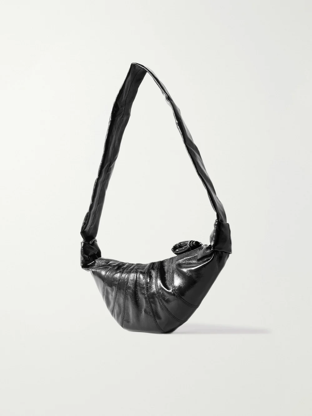 Back view of the Lemaire Croissant Small Paneled Coated-canvas Shoulder Bag