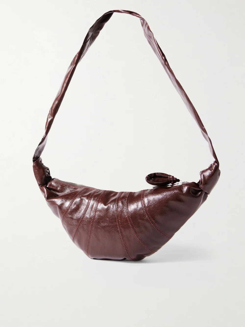 Back view of the Lemaire Croissant Small Paneled Coated-canvas Shoulder Bag
