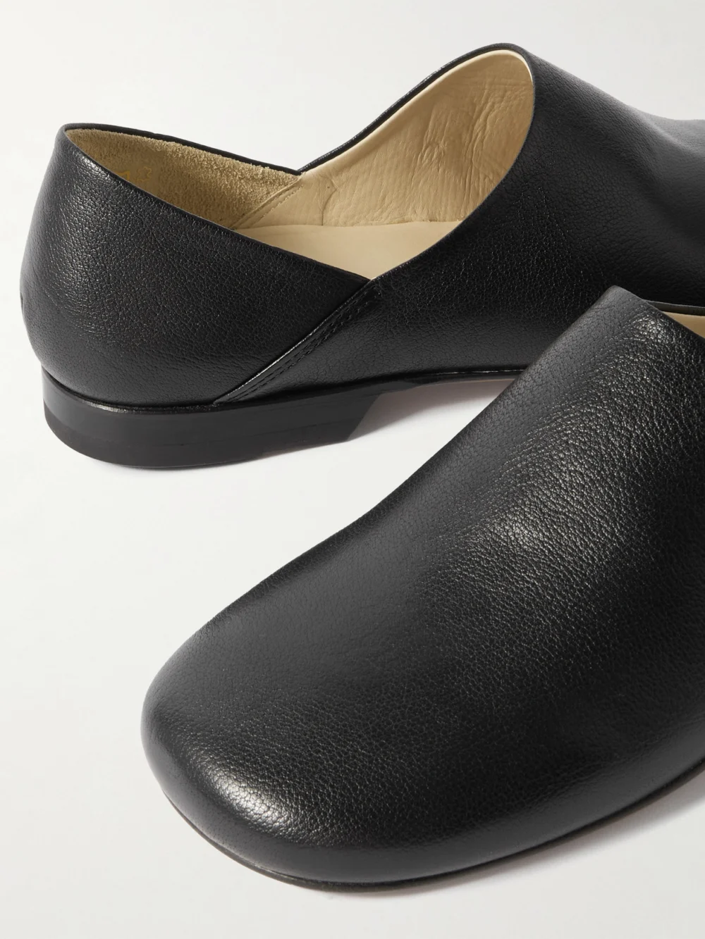 Close-up detail of the Lemaire Full-grain Leather Loafers