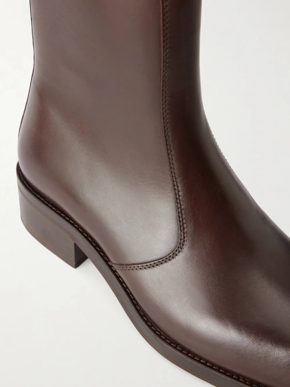 Close-up detail of the Lemaire Leather Ankle Boots