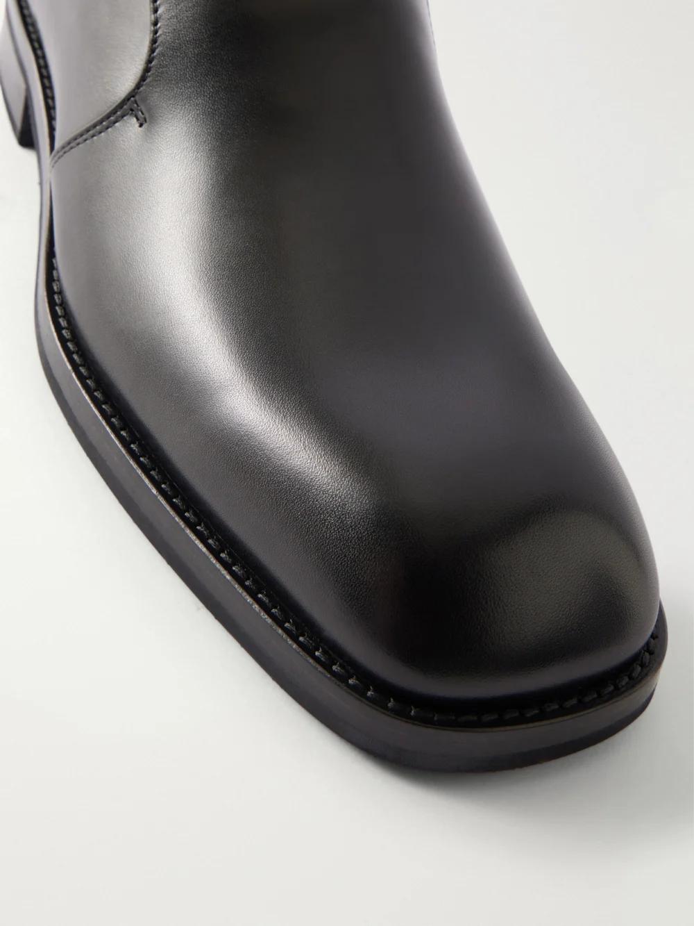 Close-up detail of the Lemaire Leather Loafers