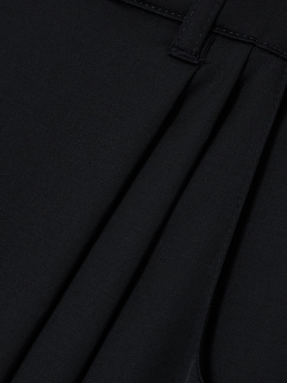 Close-up detail of the Liberowe Annie Pleated Satin-twill Wide-leg Pants
