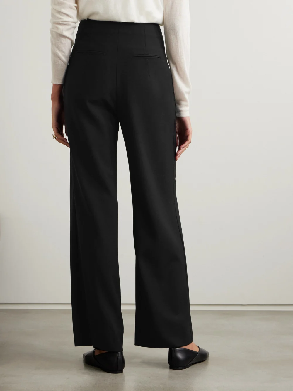 Back view of the Liberowe Annie Pleated Wool Wide-leg Pants