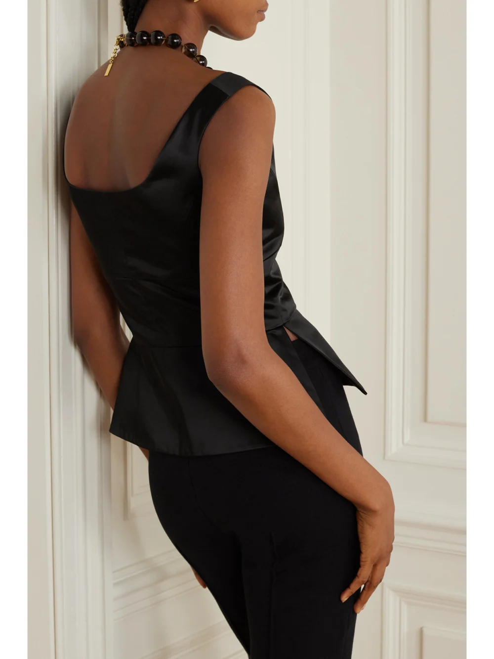 Back view of the Liberowe Off-the-shoulder Duchesse Cotton-blend Satin Peplum Top