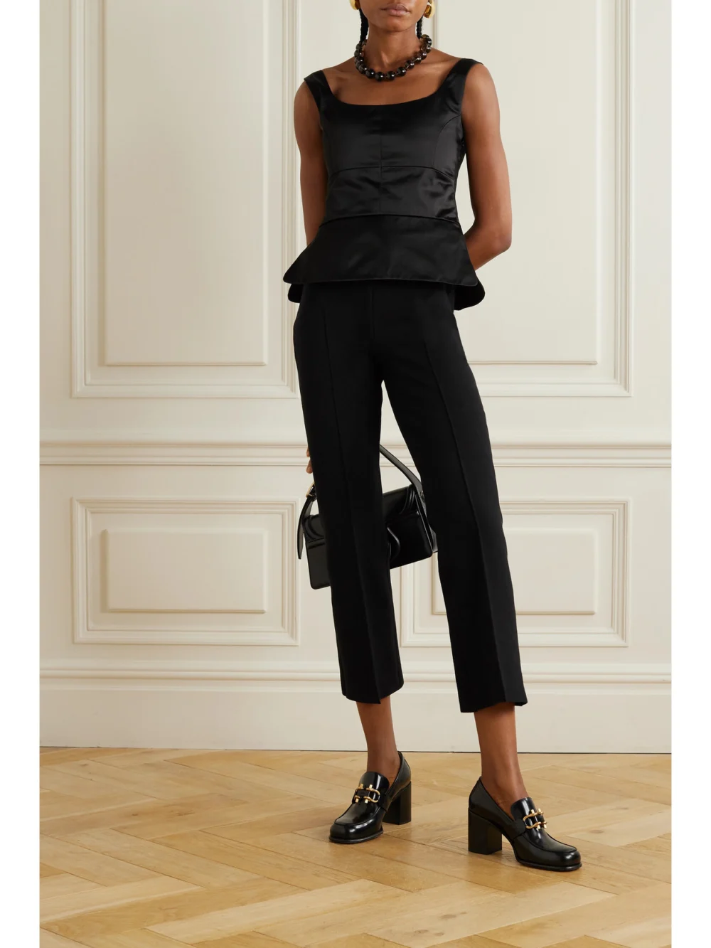 Liberowe Off-the-shoulder Duchesse Cotton-blend Satin Peplum Top, worn by a model
