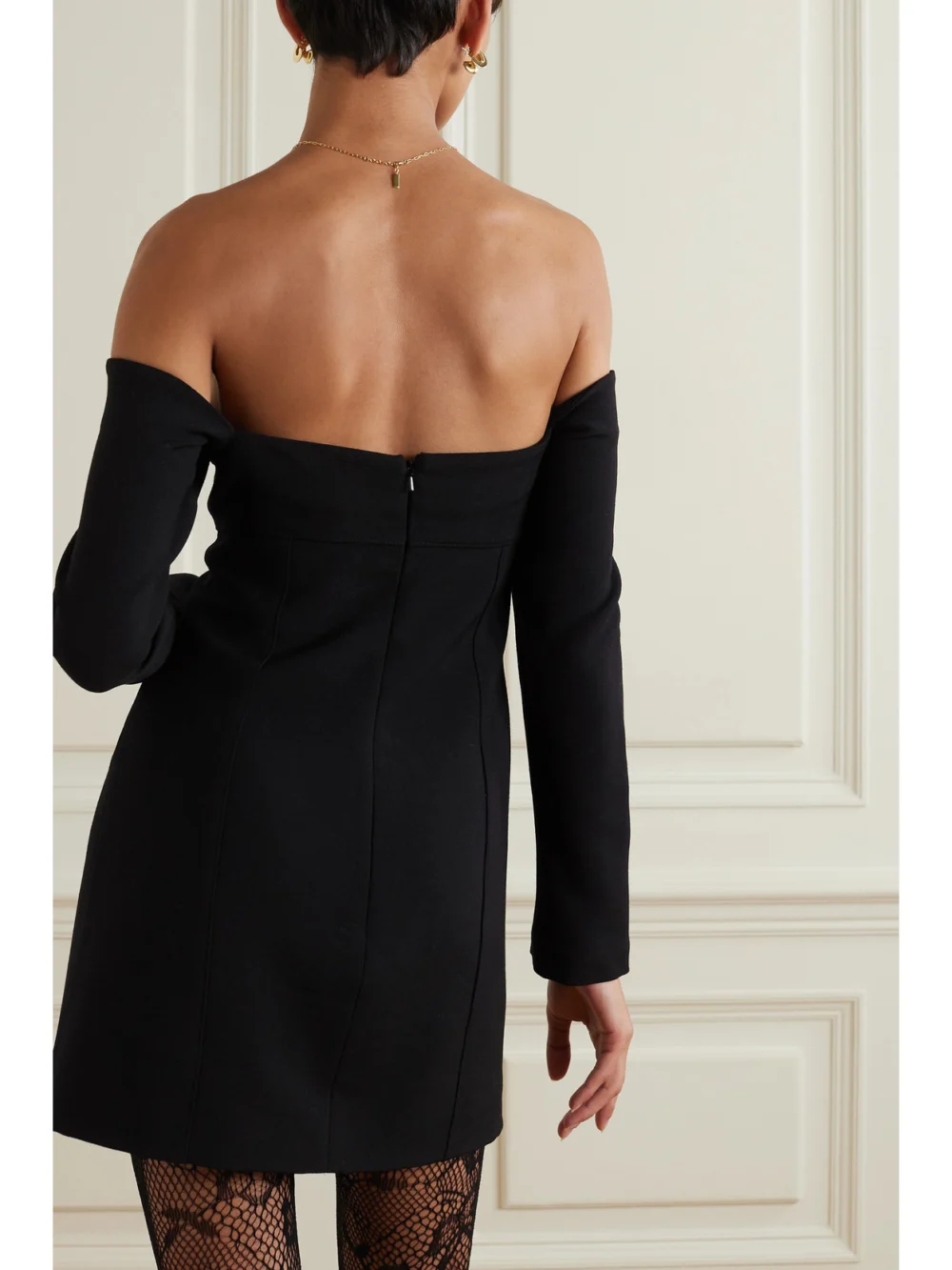 Back view of the Liberowe Off-the-shoulder Gathered Wool Mini Dress