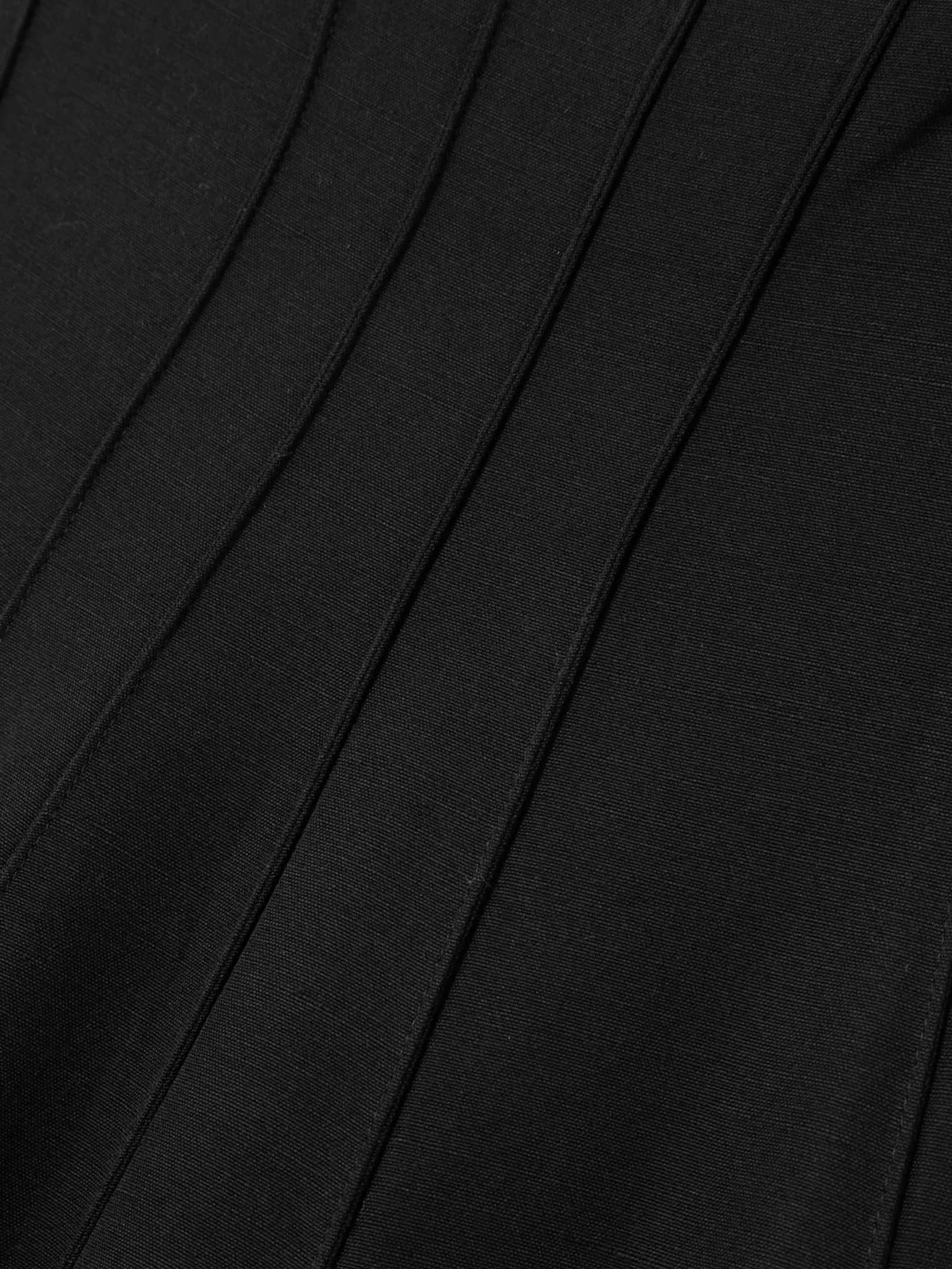 Close-up detail of the Liberowe Pleated Crepe Midi Dress