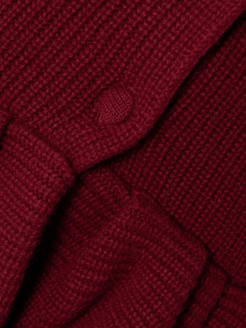Close-up detail of the Liberowe Ruffled Cashmere Peplum Cardigan