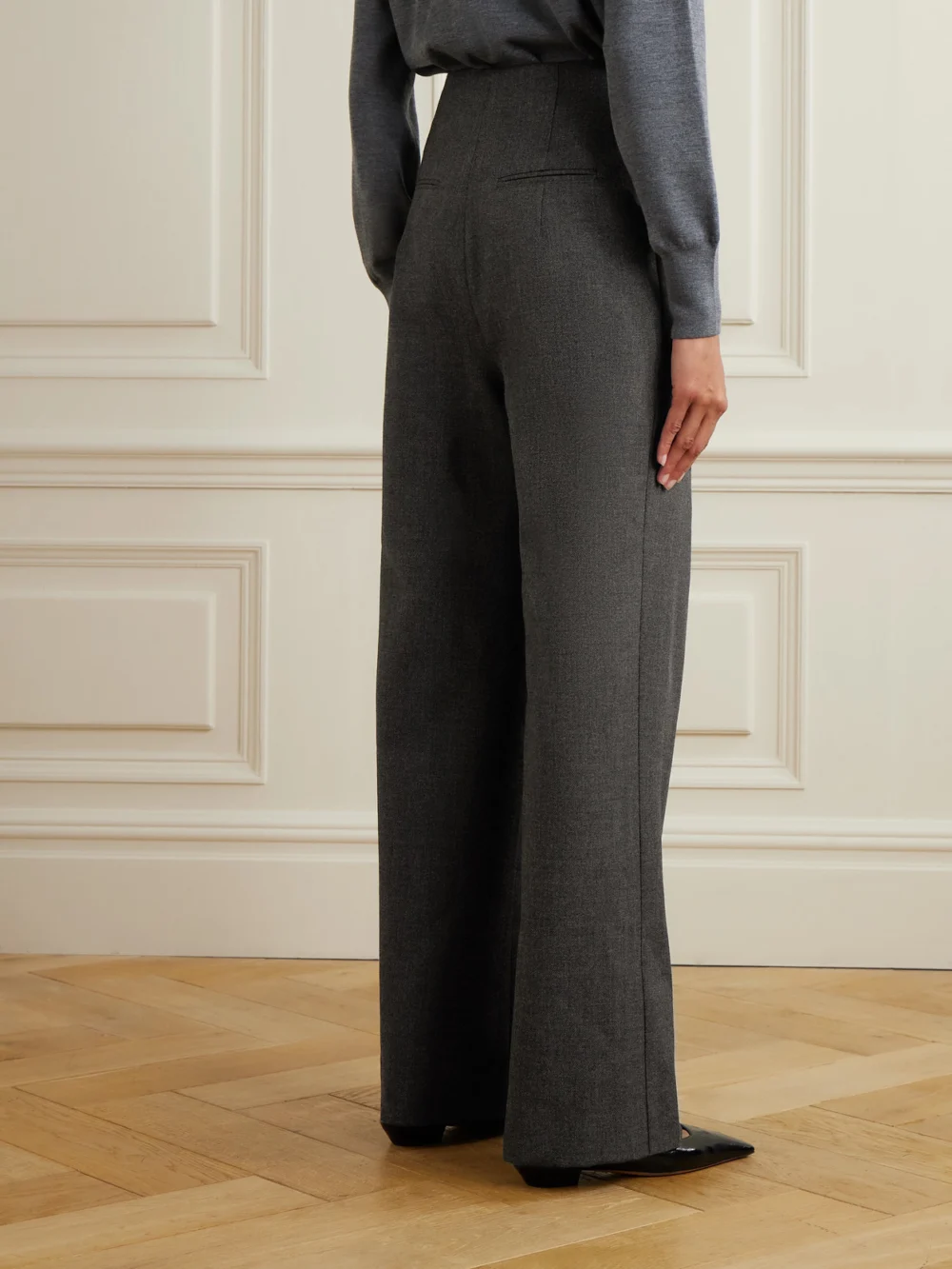 Back view of the Liberowe + the Vanguard Annie Pleated Wool Wide-leg Pants
