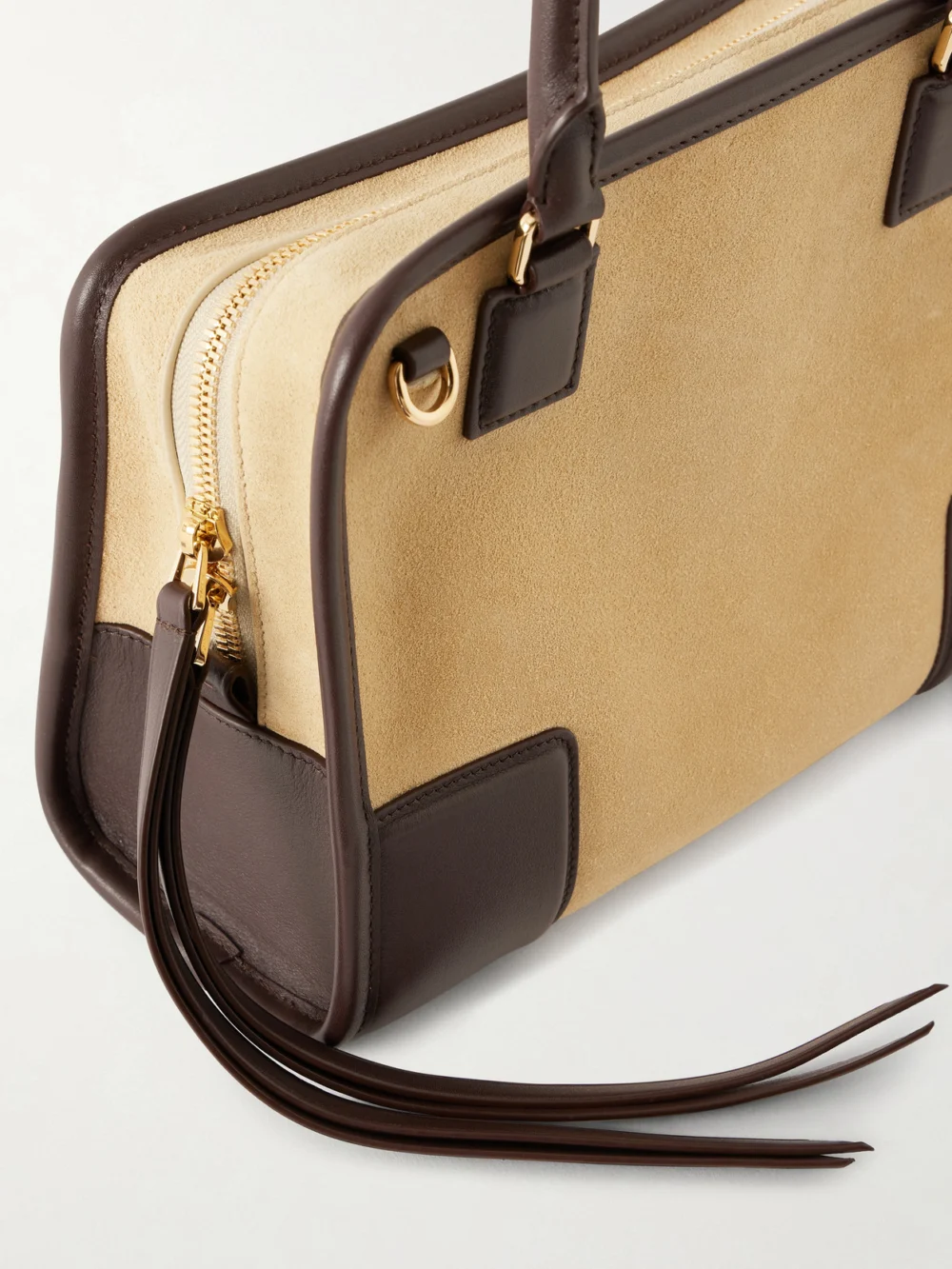 Close-up detail of the Loewe Amazona 180 Small Leather-trimmed Suede Shoulder Bag