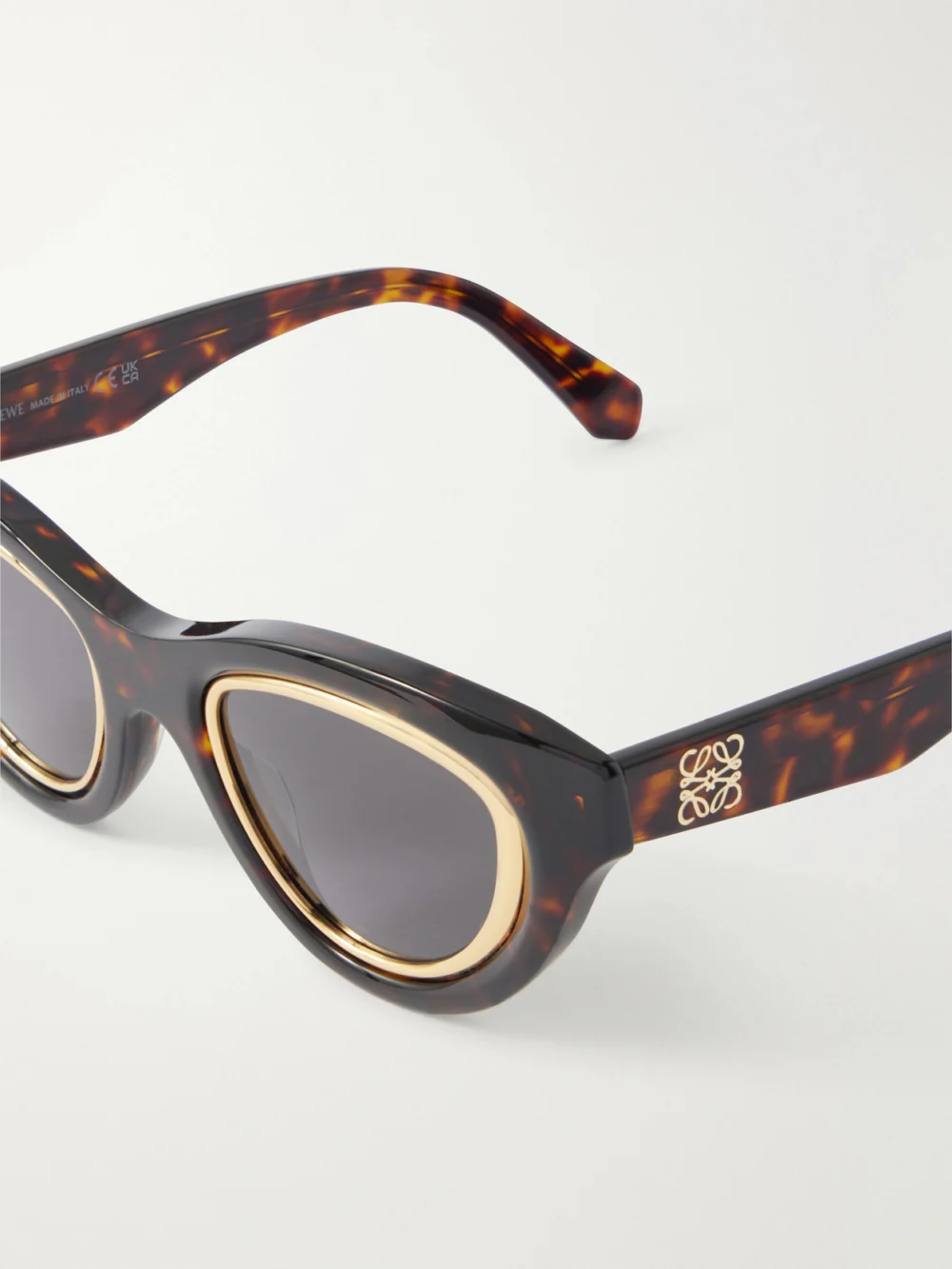 Close-up detail of the Loewe Anagram Cat-eye Tortoiseshell Acetate and Gold-tone Sunglasses