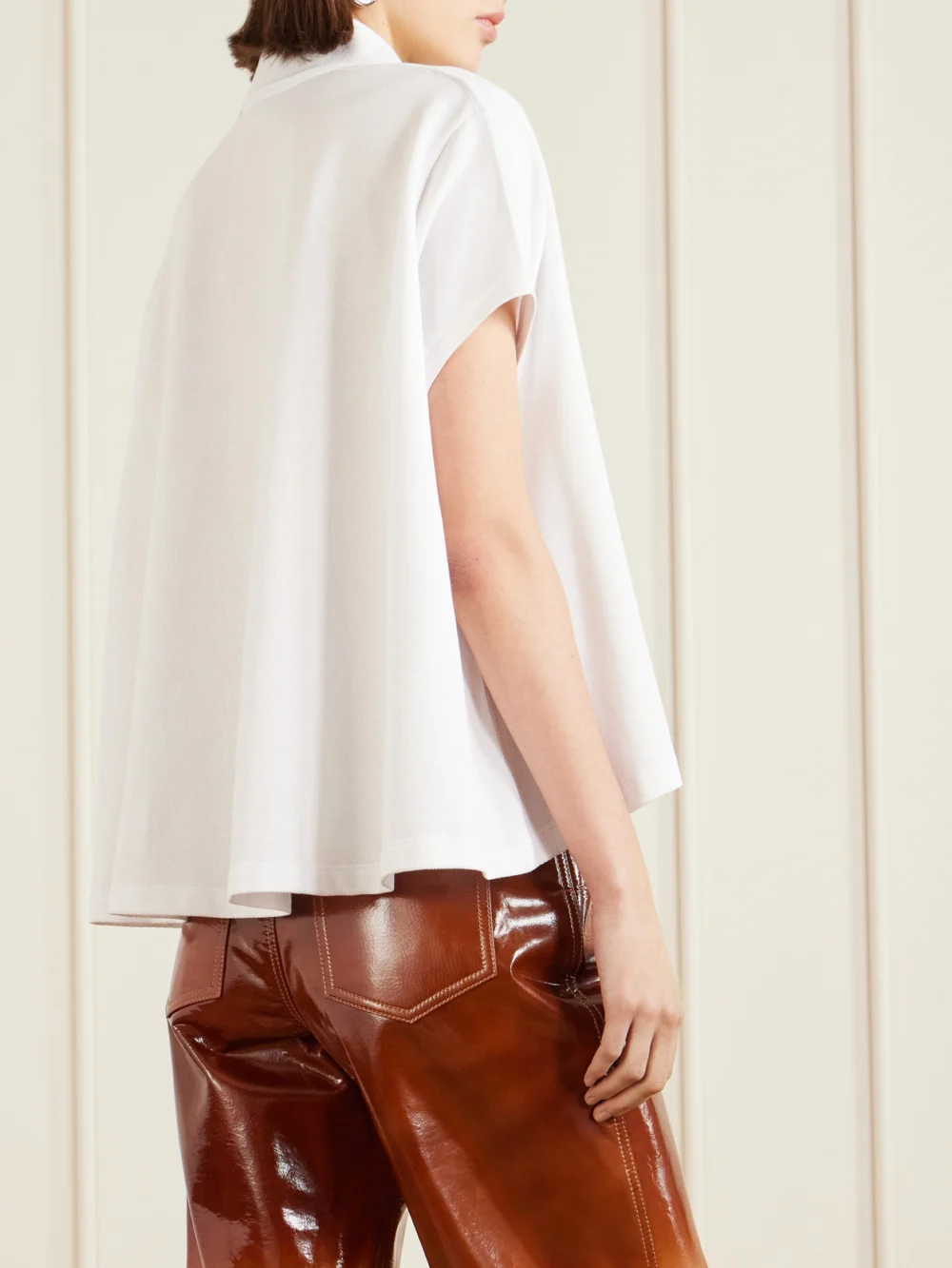 Back view of the Loewe Anagram Embroidered Cotton-piqué Polo Shirt