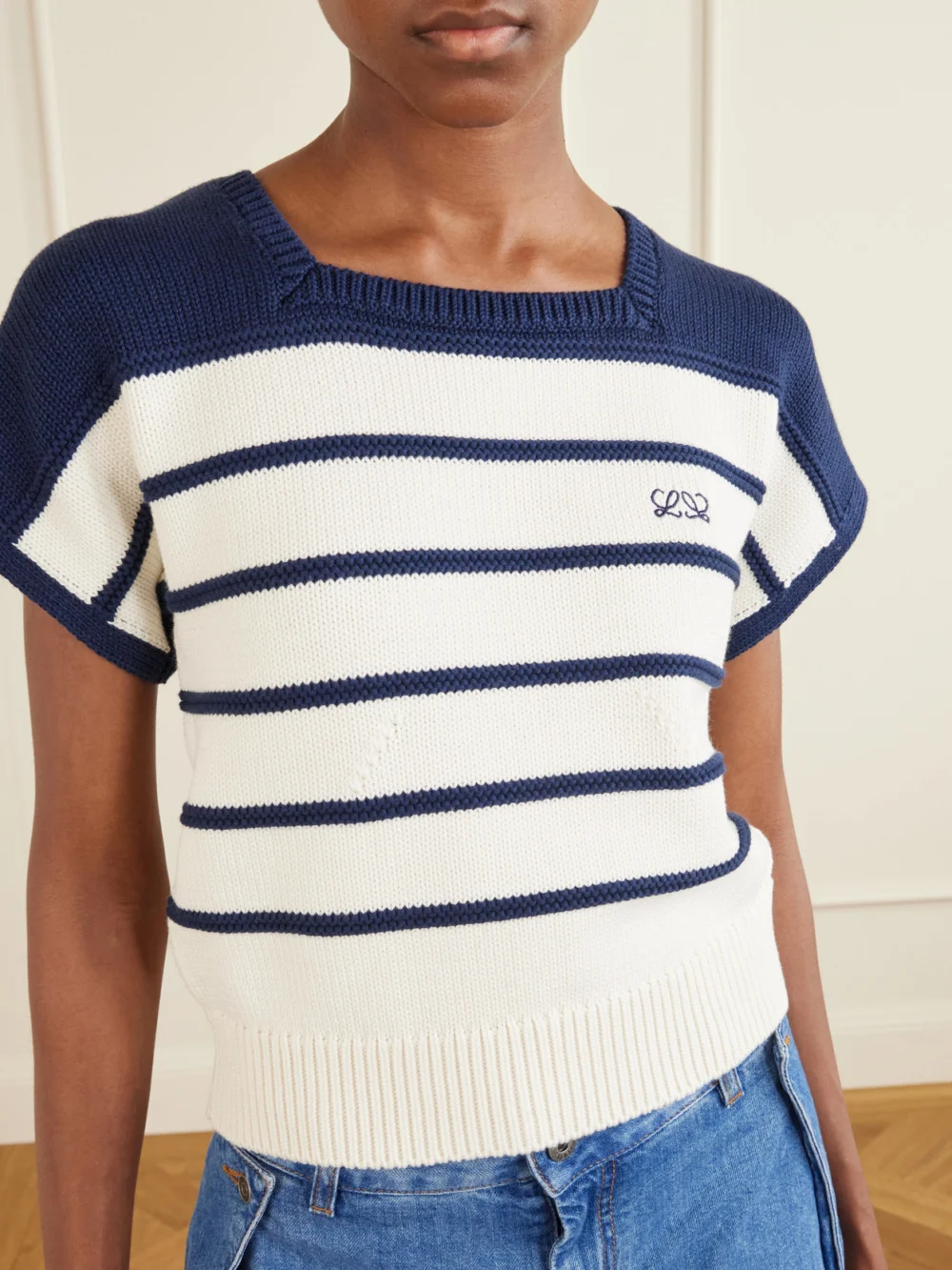 Close-up detail of the Loewe Anagram-embroidered Striped Cotton and Wool-blend Sweater