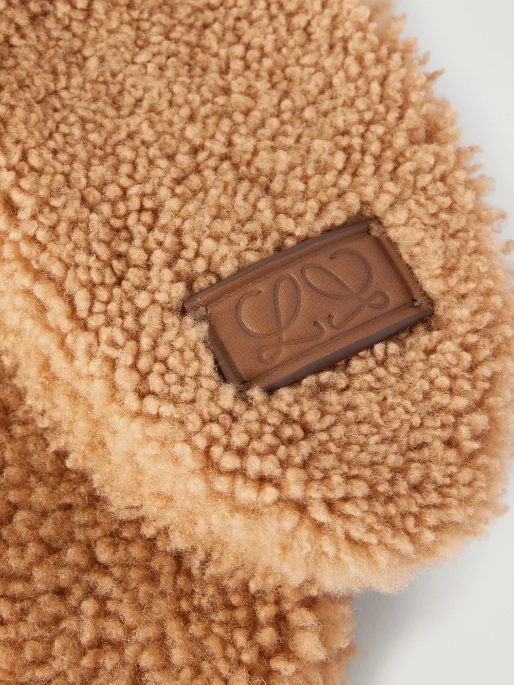Close-up detail of the Loewe Aviator Shearling Trapper Hat