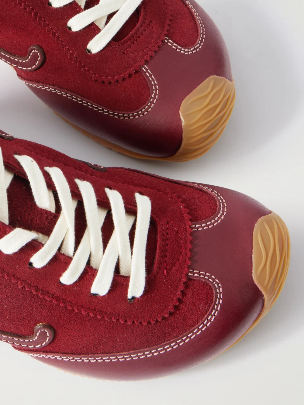Close-up detail of the Loewe Ballet Runner 2.0 Logo-appliquéd Leather and Suede Sneakers