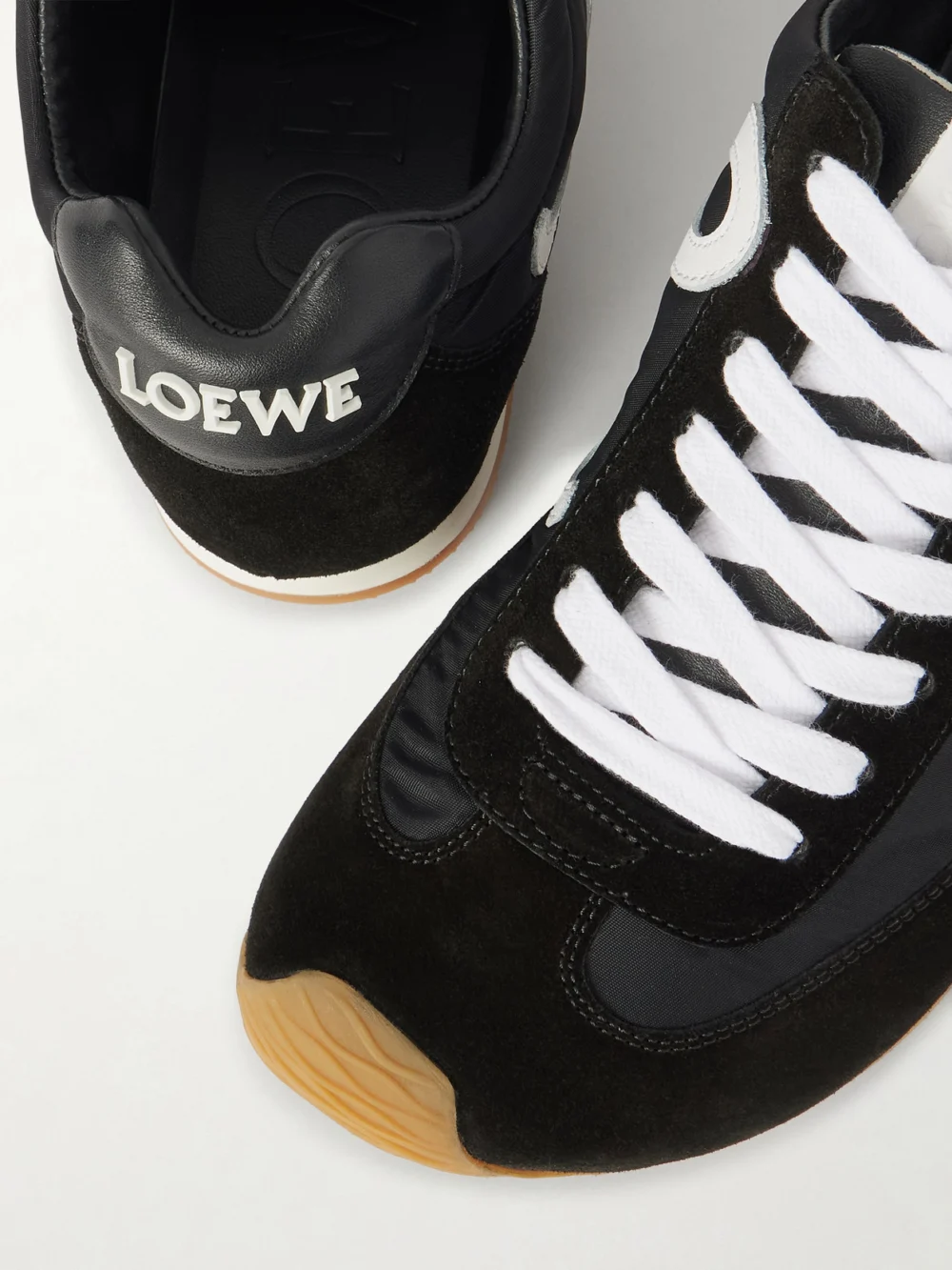Close-up detail of the Loewe Ballet Runner 2.0 Logo-appliquéd Leather, Shell and Suede Sneakers