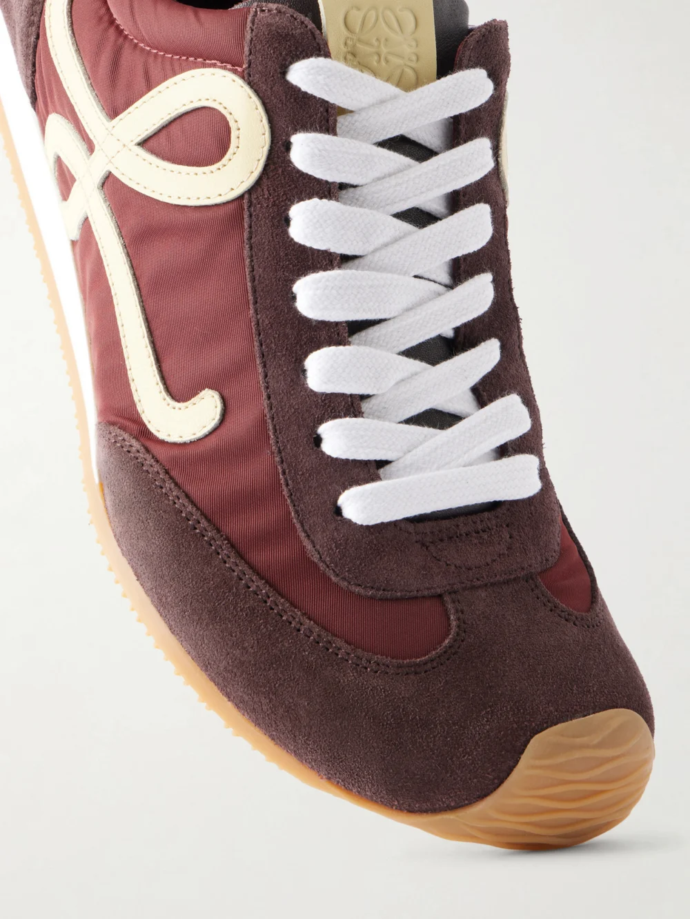 Close-up detail of the Loewe Ballet Runner 2.0 Logo-appliquéd Suede-trimmed Shell Sneakers