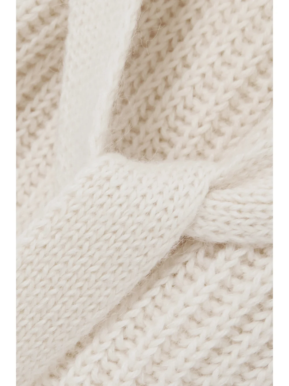 Close-up detail of the Loewe Belted Ribbed Alpaca-blend Sweater