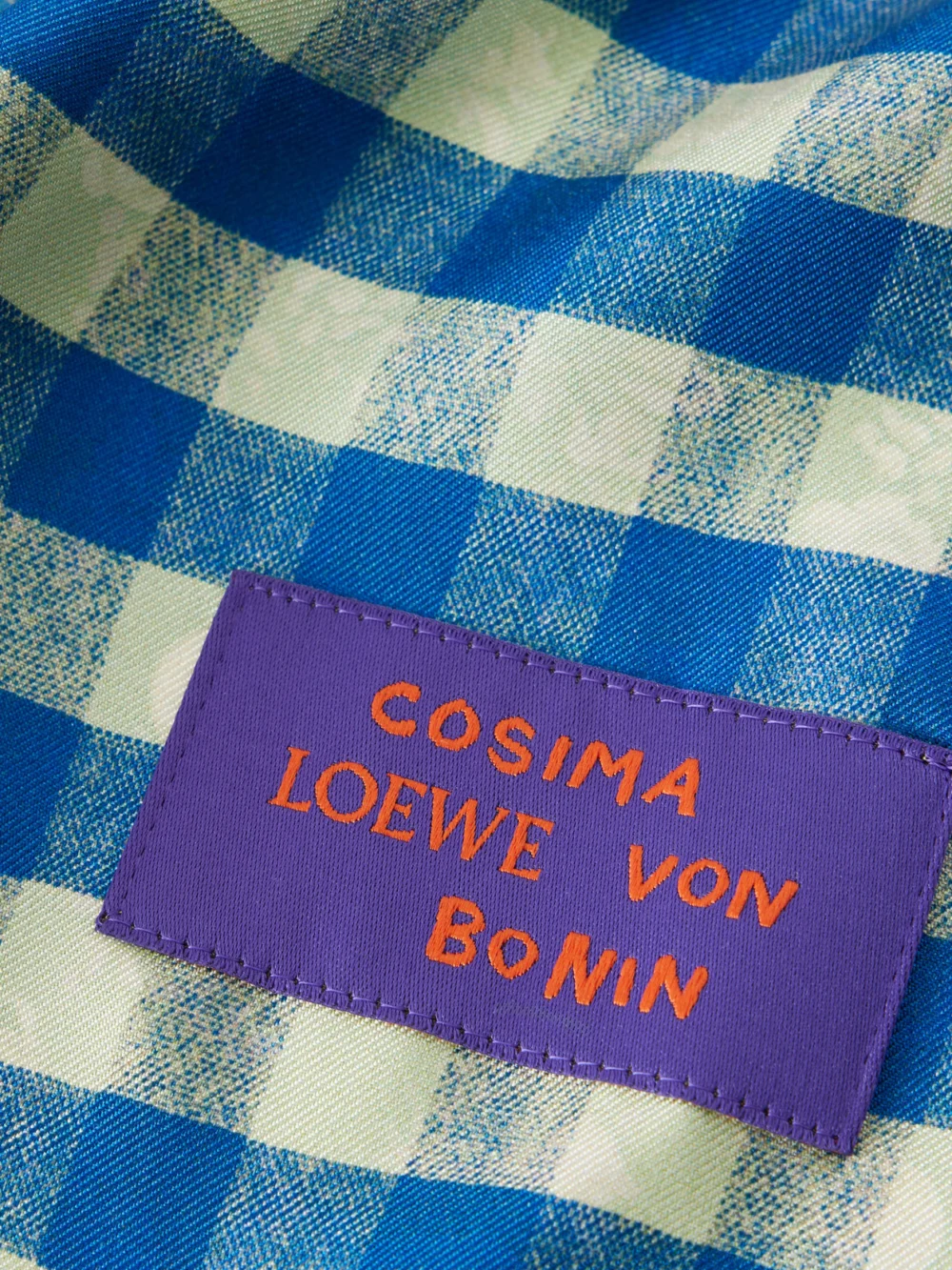 Close-up detail of the Loewe Checked and Floral-print Silk Scarf