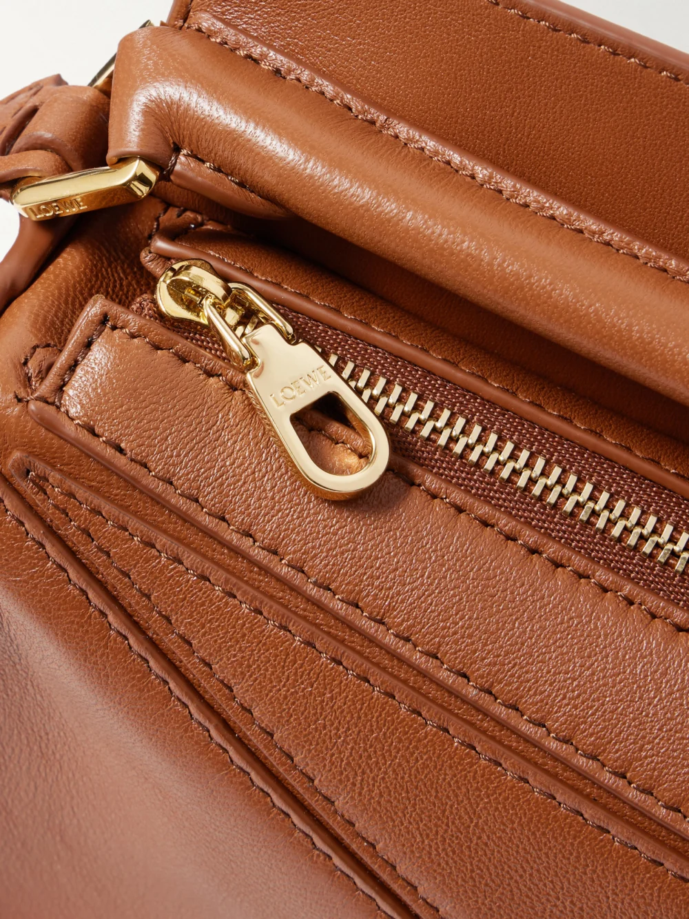 Close-up detail of the Loewe Featherlight Puzzle Mini Textured-leather Top-handle Bag