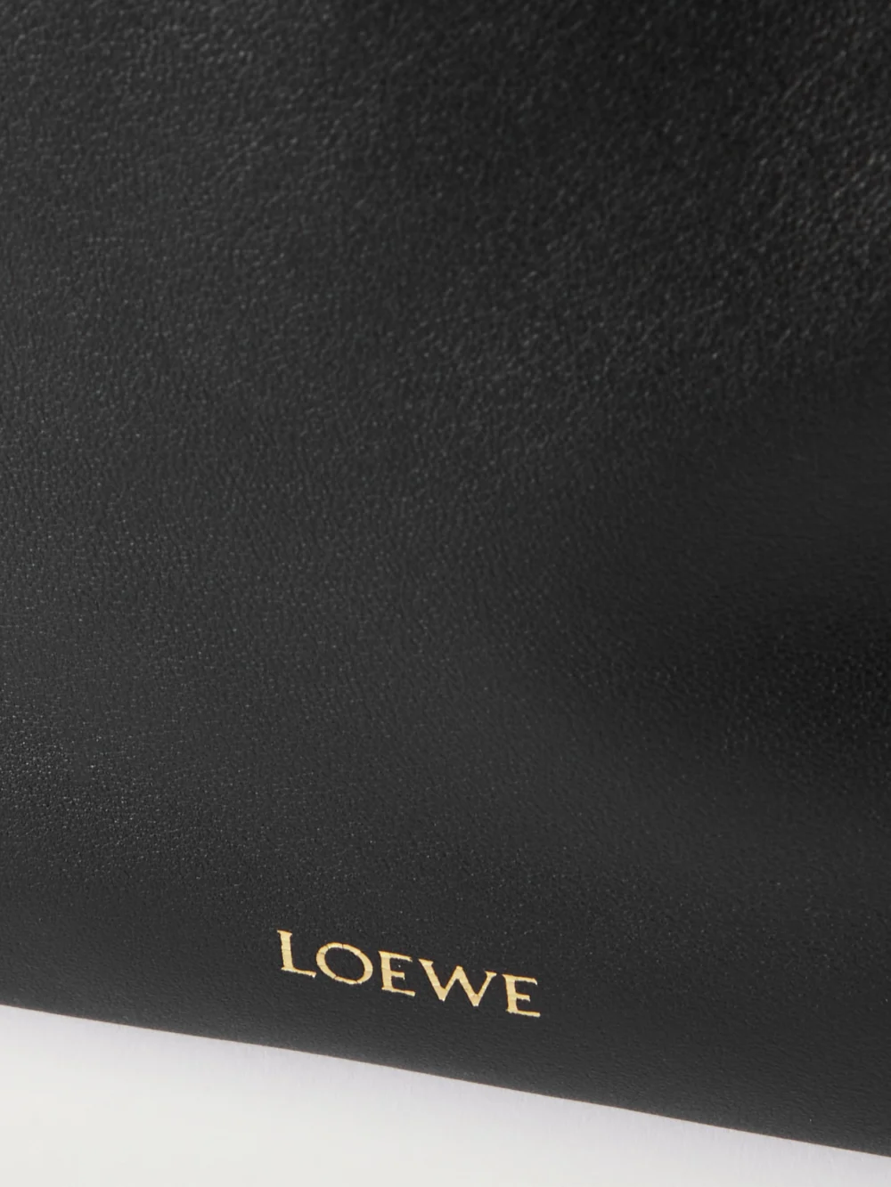 Close-up detail of the Loewe Flamenco Leather Clutch