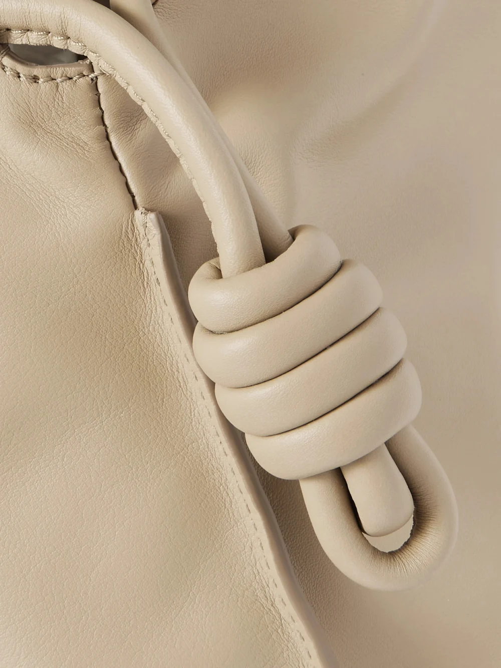 Close-up detail of the Loewe Flamenco Leather Clutch