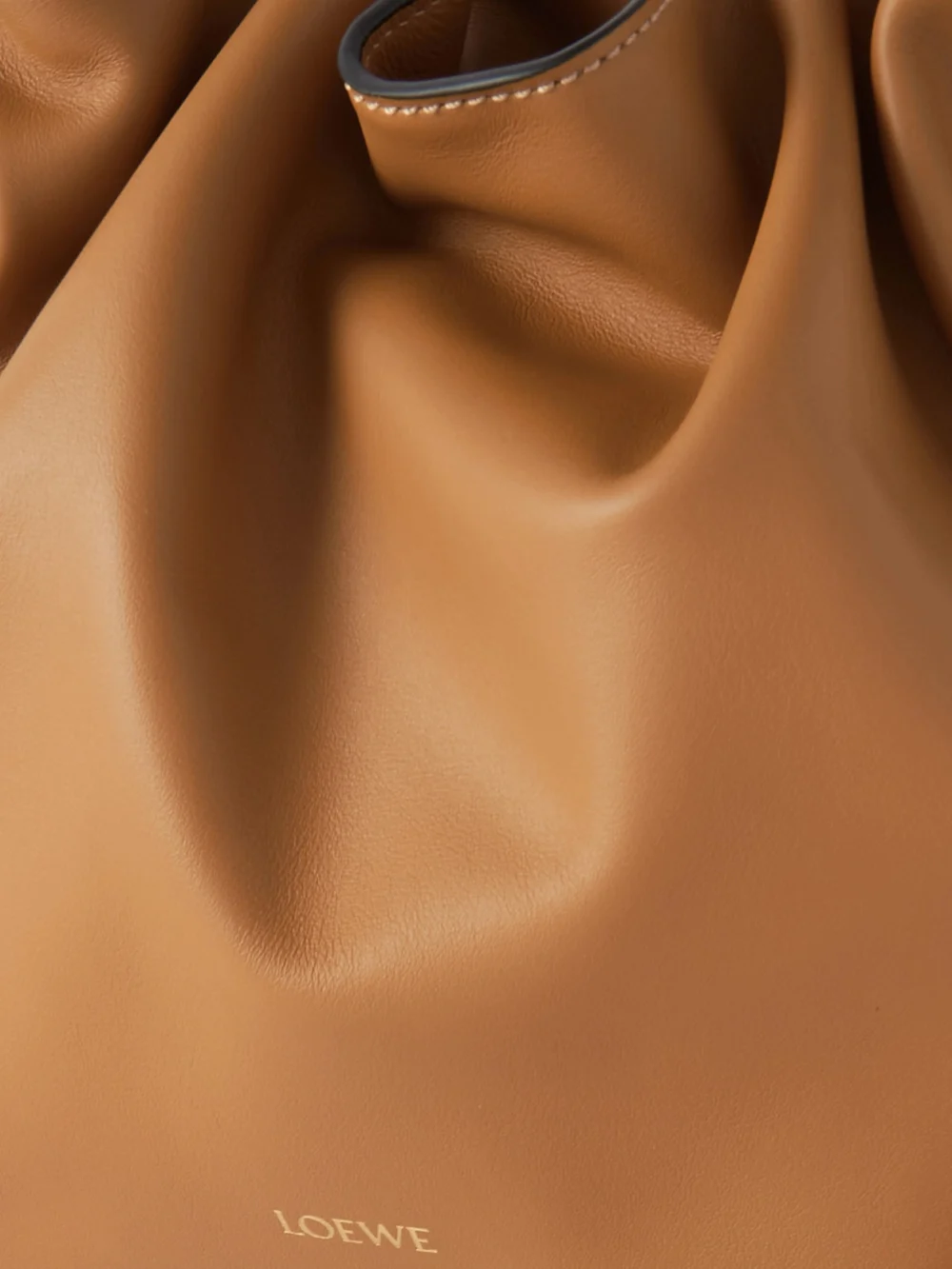 Close-up detail of the Loewe Flamenco Leather Clutch