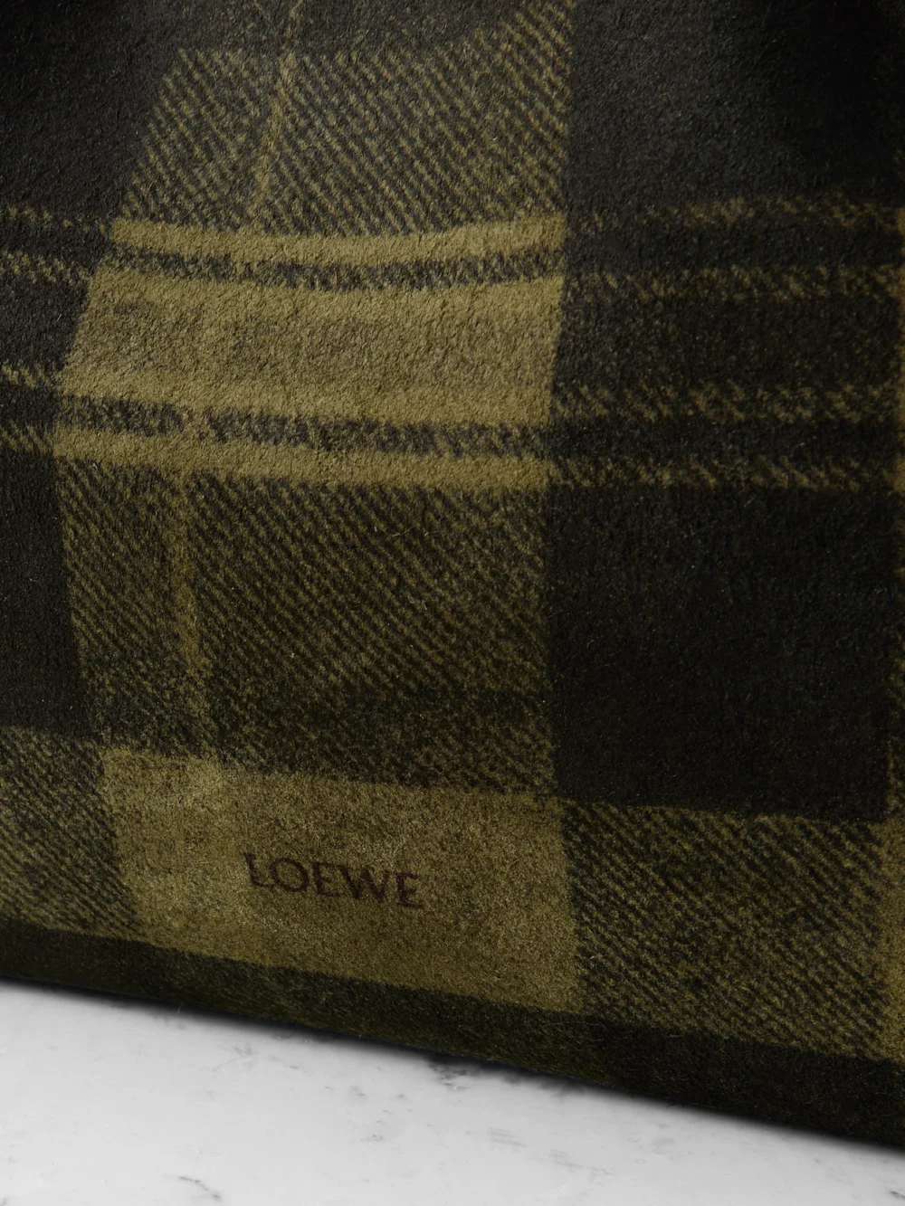 Close-up detail of the Loewe Flamenco Medium Leather-trimmed Checked Suede Shoulder Bag