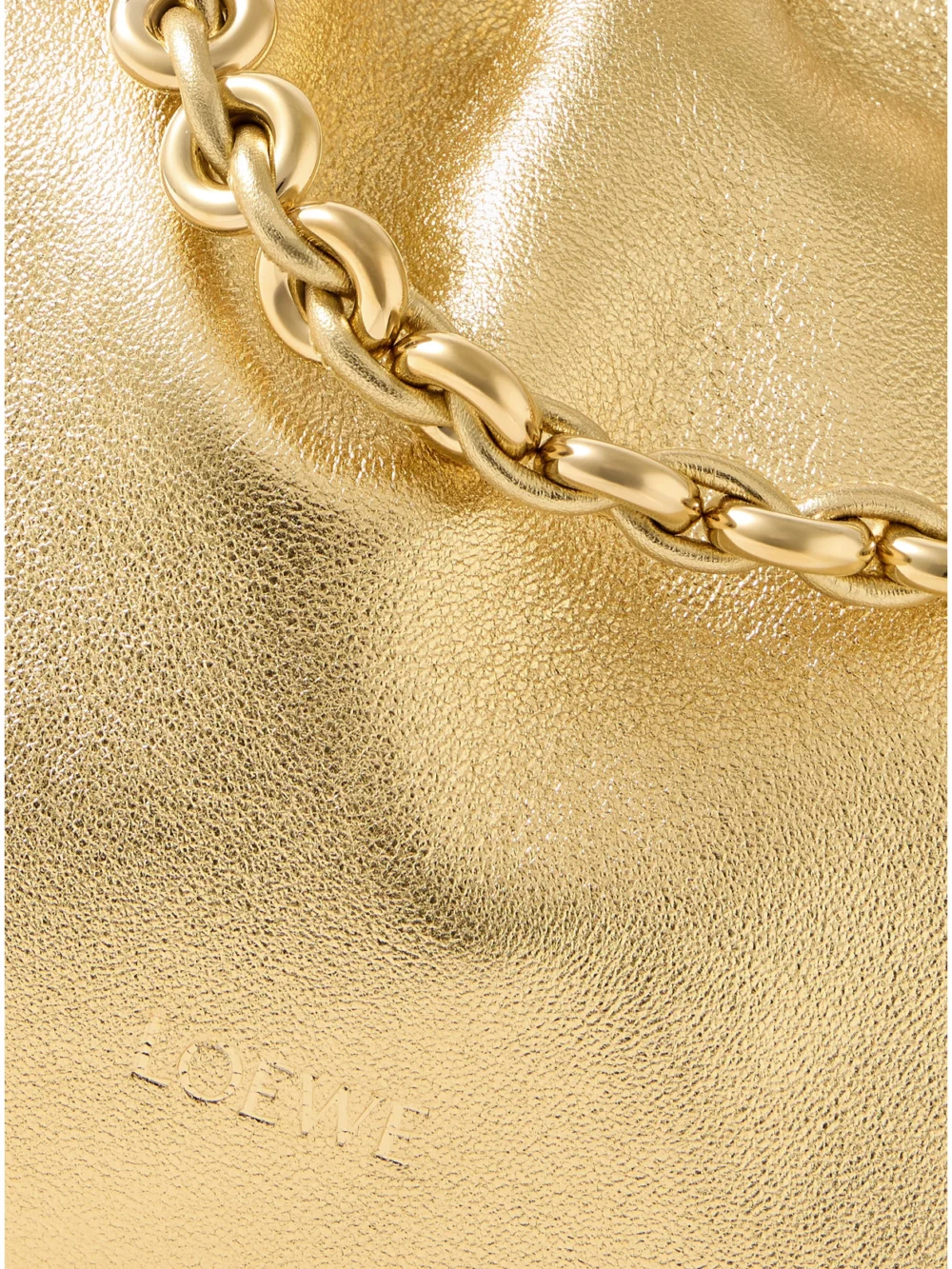 Close-up detail of the Loewe Flamenco Metallic Leather Clutch