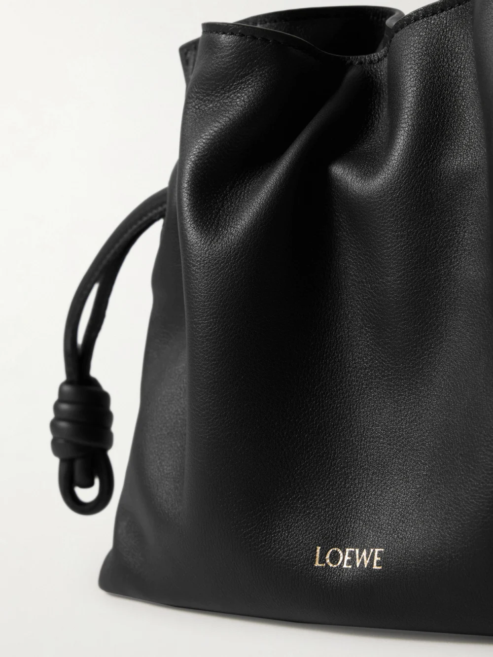 Close-up detail of the Loewe Flamenco Mini Leather Clutch