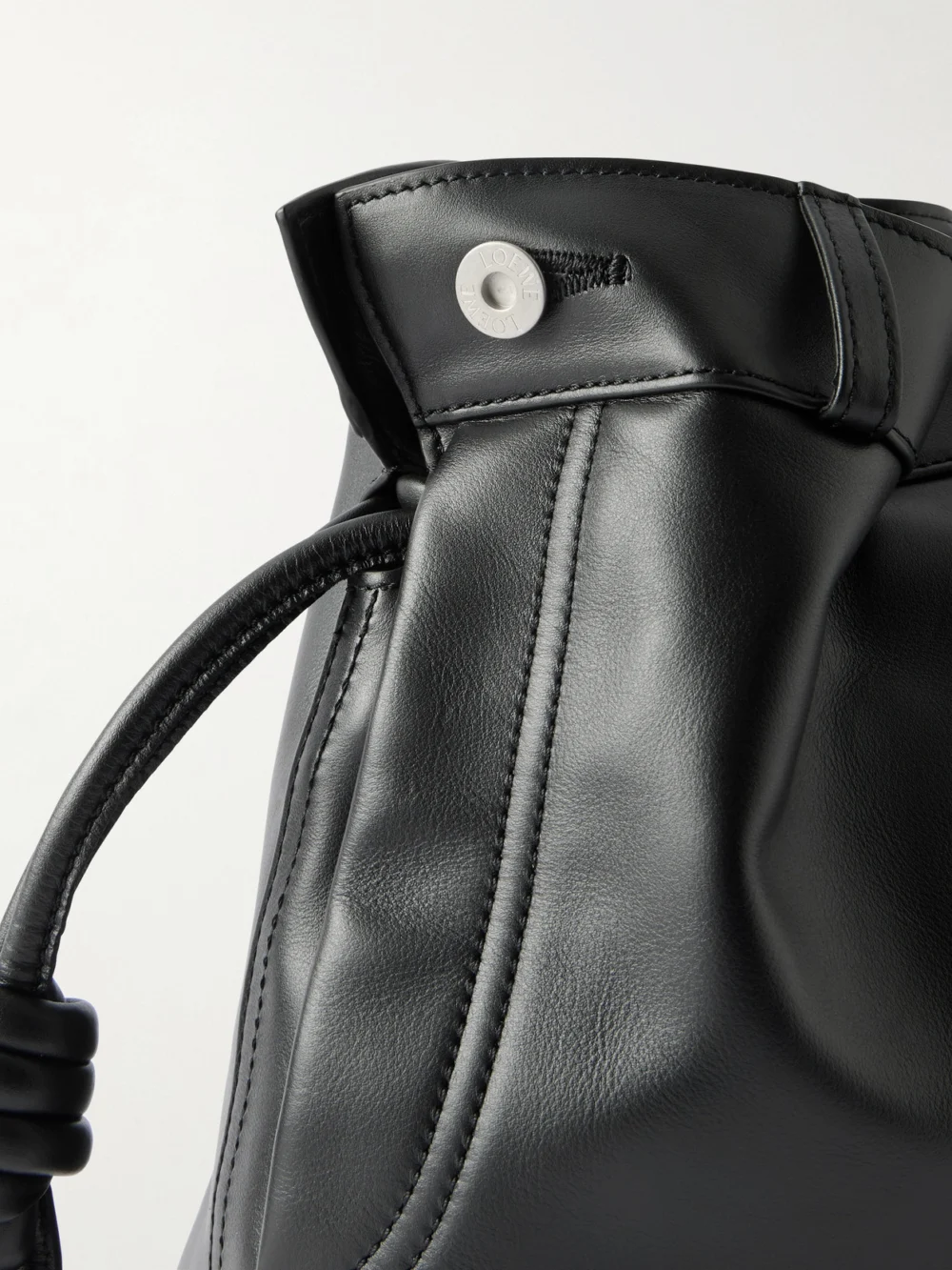 Close-up detail of the Loewe Flamenco Panta Medium Leather Clutch
