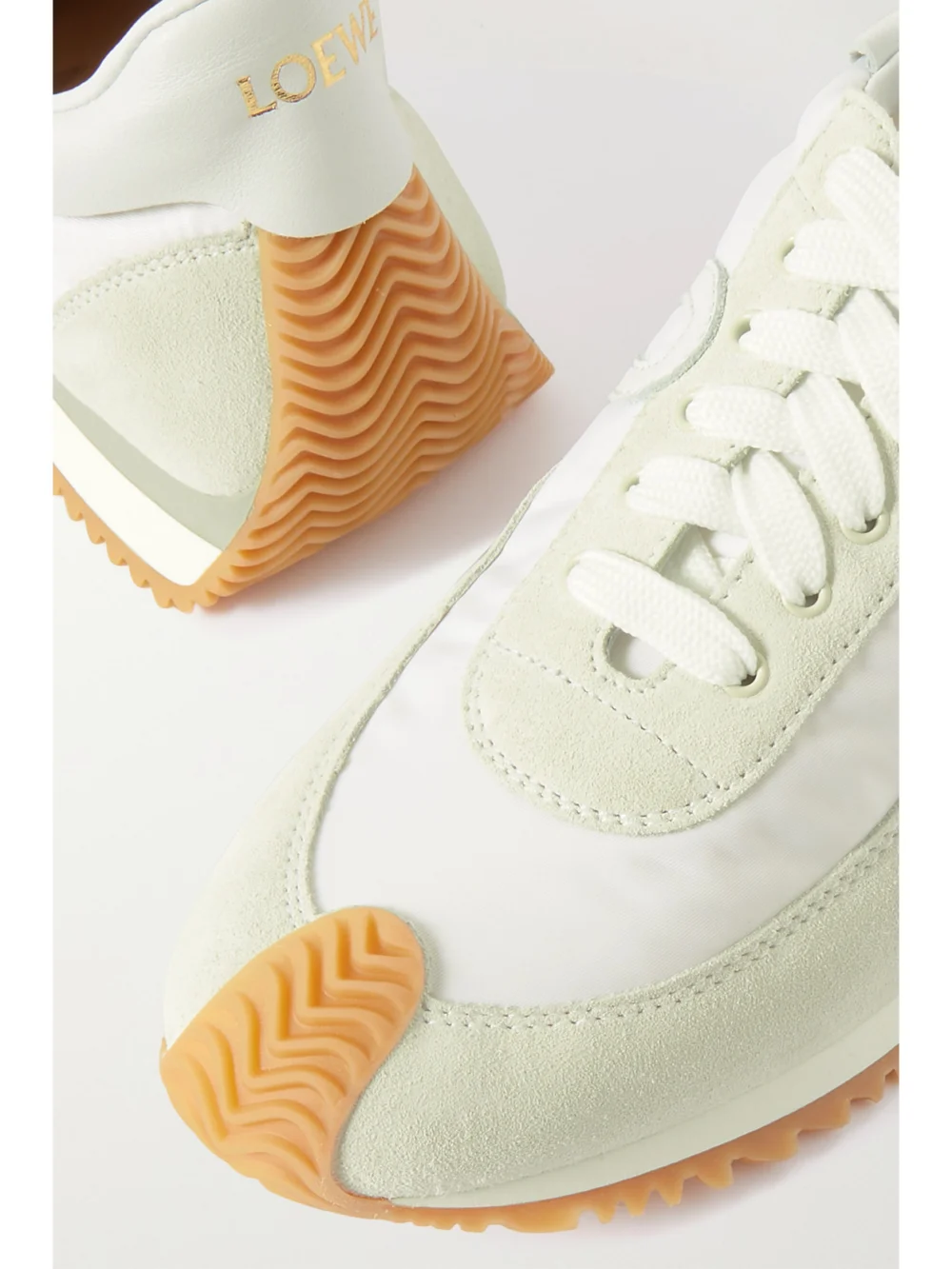 Close-up detail of the Loewe Flow Logo-appliquéd Shell, Leather and Suede Sneakers