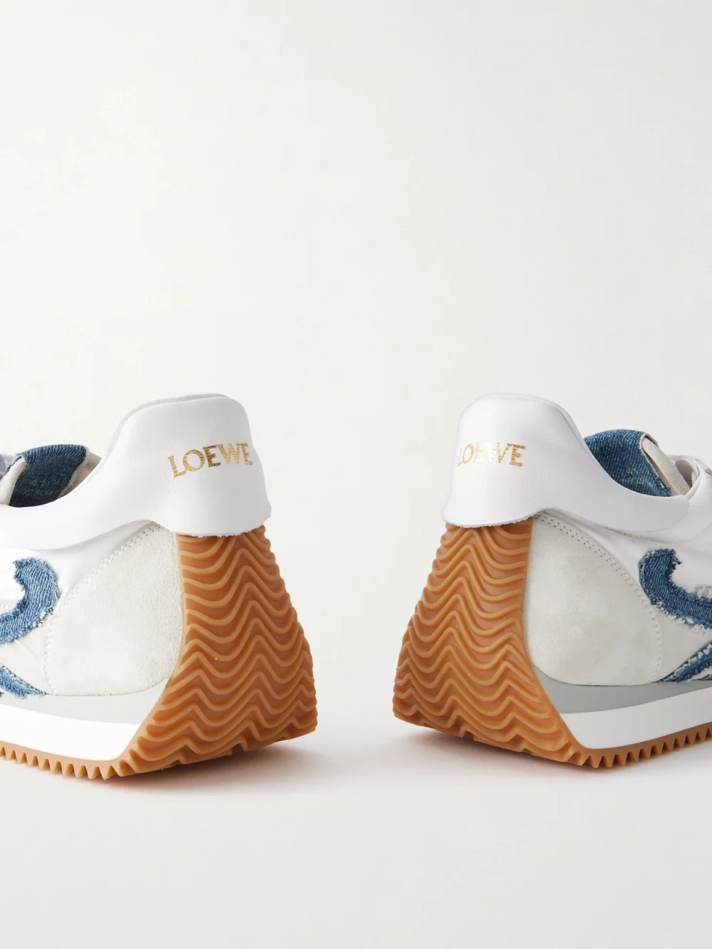 Close-up detail of the Loewe Flow Runner Denim-trimmed Shell and Suede Sneakers