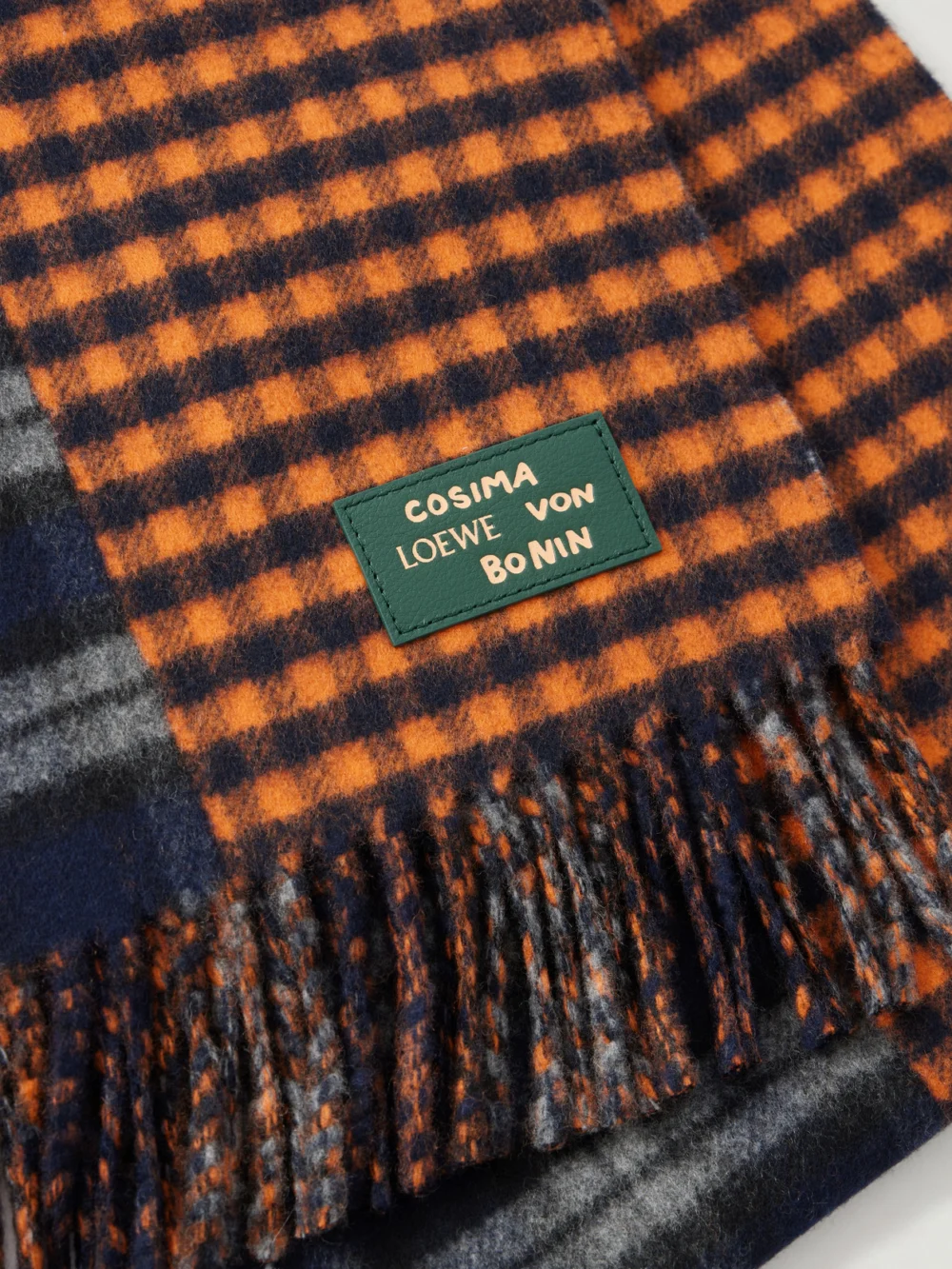 Close-up detail of the Loewe Fringed Checked Wool and Cashmere-blend Scarf