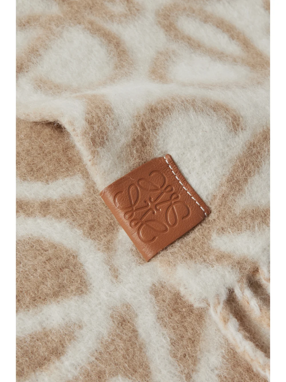 Close-up detail of the Loewe Fringed Jacquard-knit Scarf