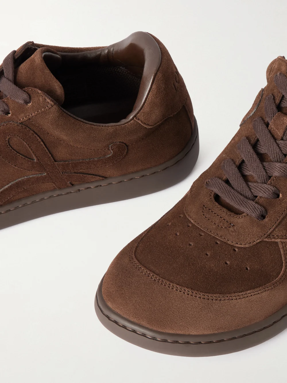 Close-up detail of the Loewe Jambo Logo-appliquéd Suede Sneakers