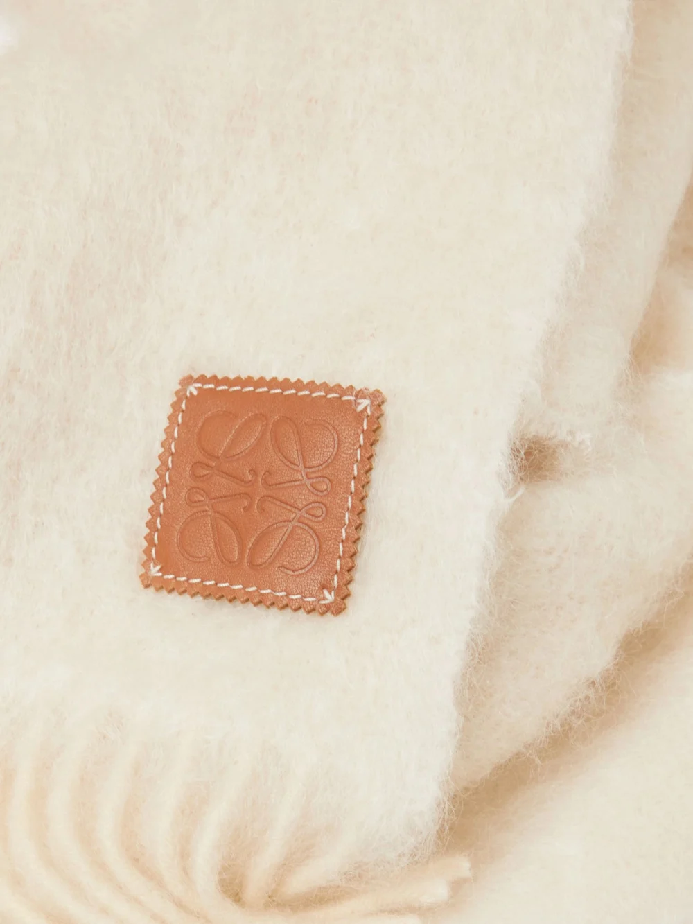 Close-up detail of the Loewe Leather-trimmed Fringed Mohair-blend Scarf