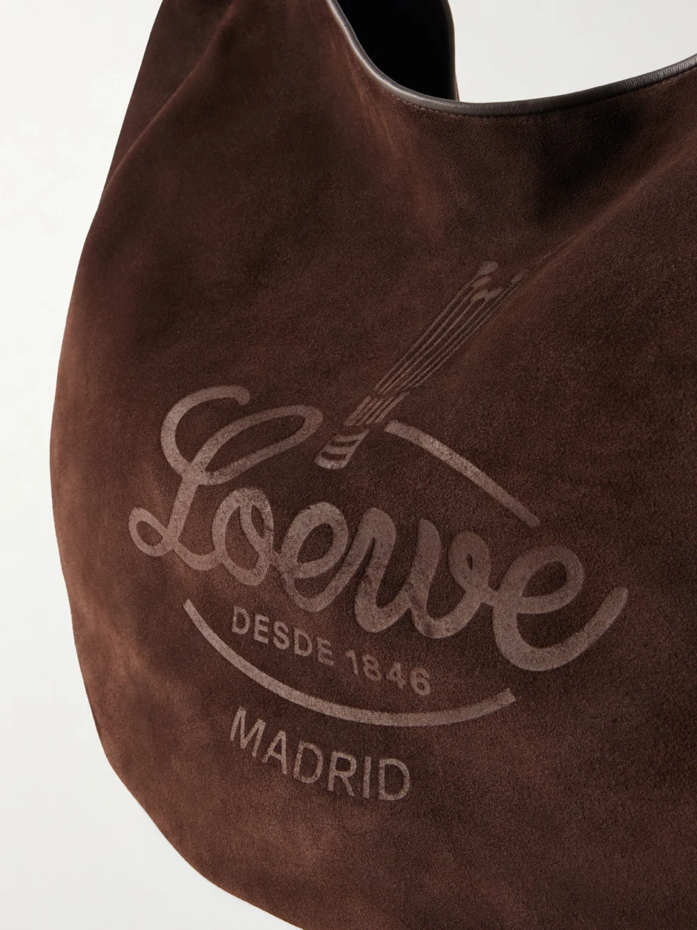 Close-up detail of the Loewe Logo-debossed Leather-trimmed Suede Tote