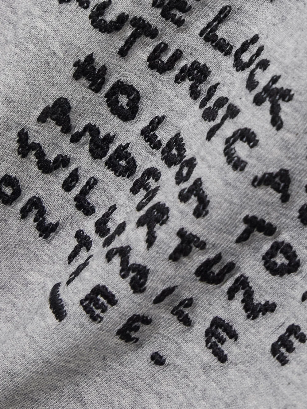 Close-up detail of the Loewe + Louis Wain Embroidered Cotton-jersey T-shirt