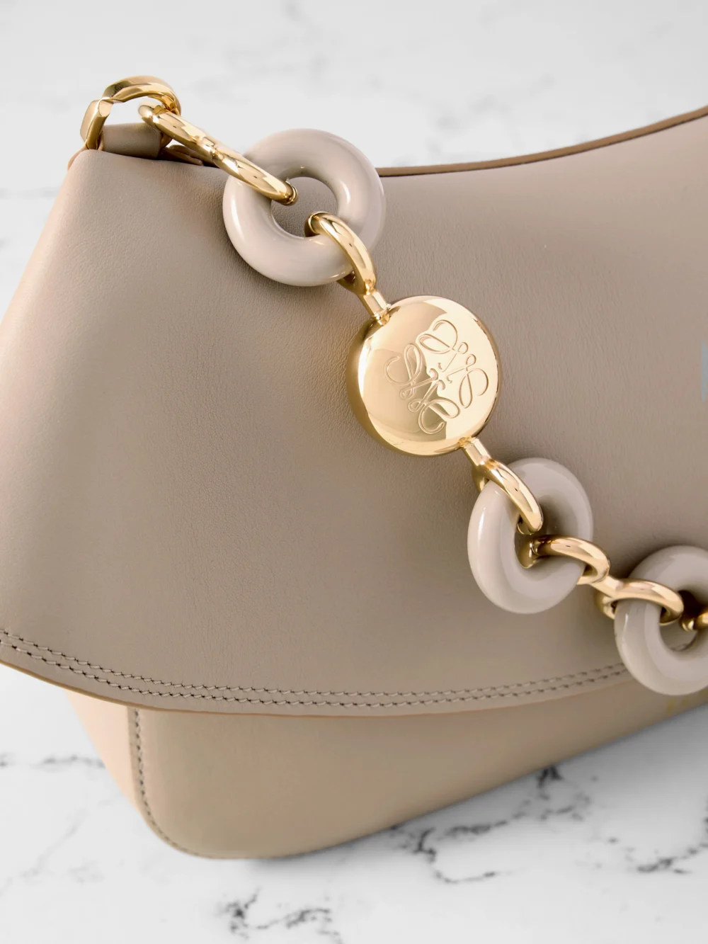 Close-up detail of the Loewe Ola Medium Embellished Leather Shoulder Bag