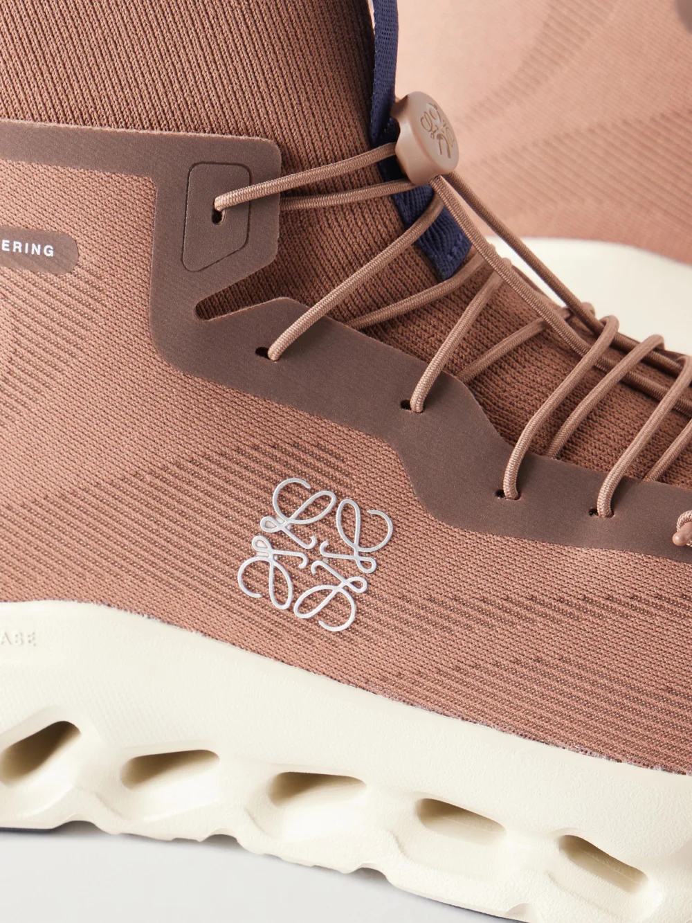 Close-up detail of the Loewe + on Cloudtilt Sneakers