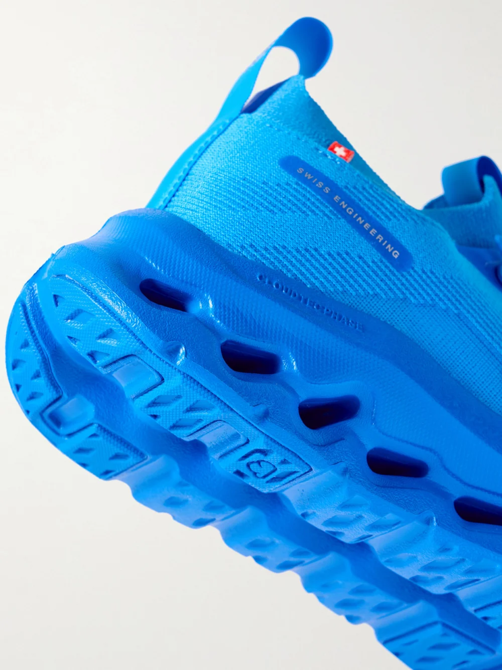 Close-up detail of the Loewe + on Cloudtilt Stretch Recycled-knit Sneakers