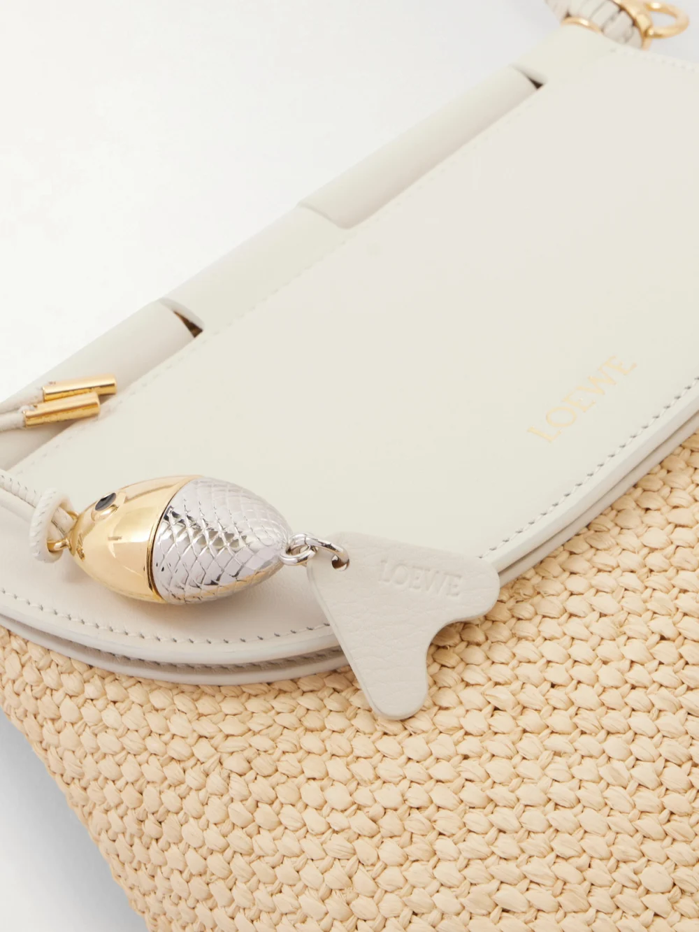Close-up detail of the Loewe + Paula Ibiza Pescador Leather-trimmed Raffia Shoulder Bag