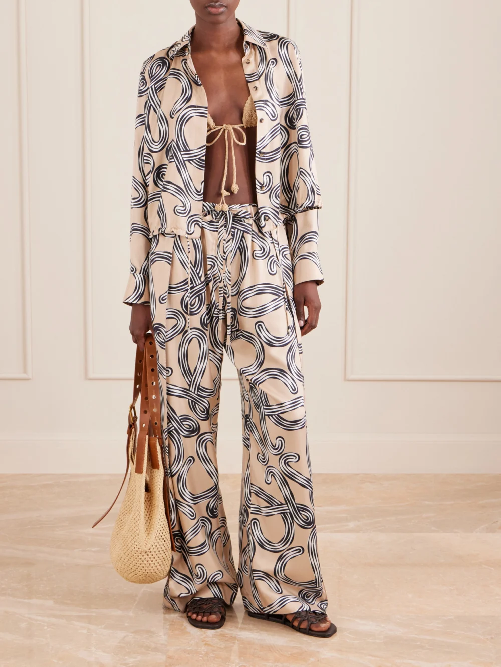 Loewe + Paula's Ibiza Anagram-printed Silk-twill Shirt, worn by a model