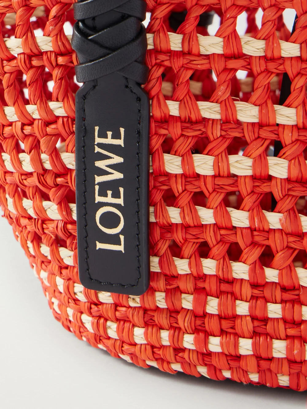 Close-up detail of the Loewe + Paula's Ibiza Braid Basket Small Leather-trimmed Raffia Shoulder Bag