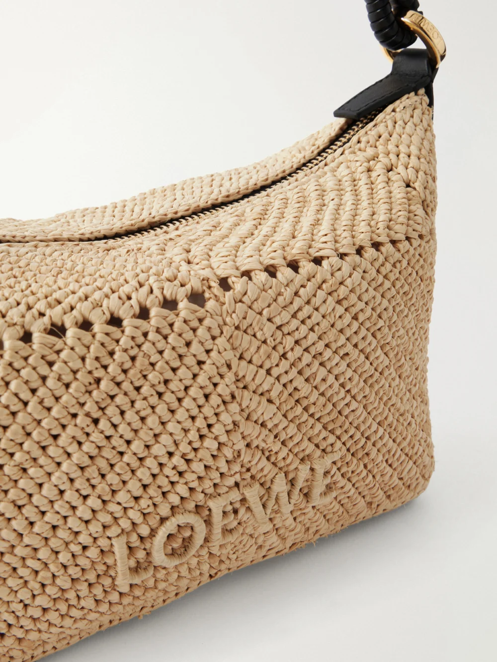 Close-up detail of the Loewe + Paula's Ibiza Cala Leather-trimmed Raffia Pouch