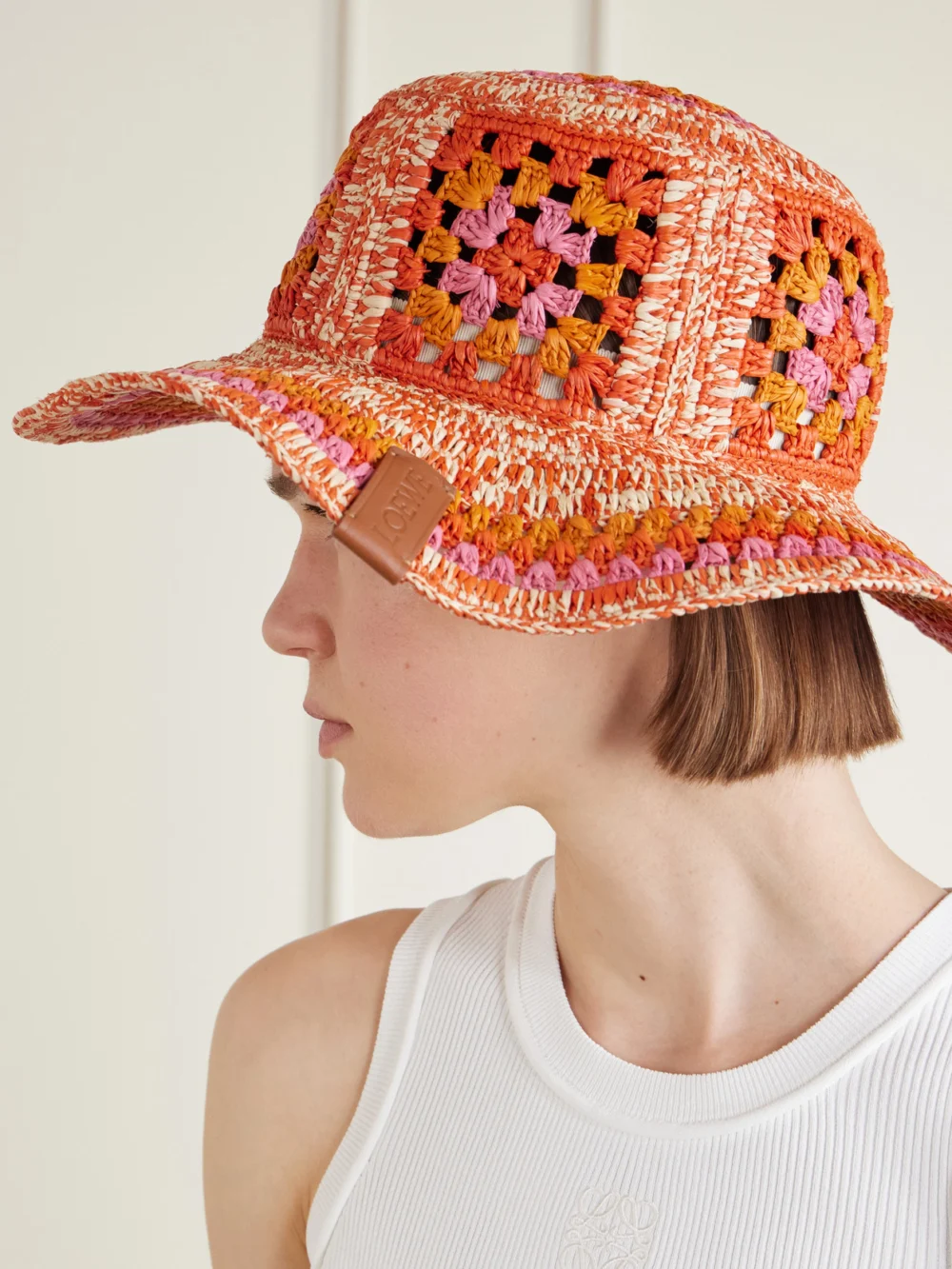 Loewe + Paula's Ibiza Crocheted Raffia Bucket Hat, styled view