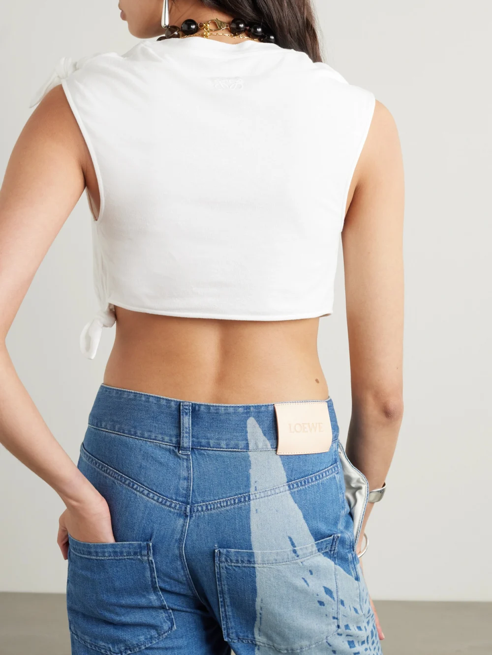Back view of the Loewe + Paula's Ibiza Cropped Knotted Cotton-blend Jersey T-shirt