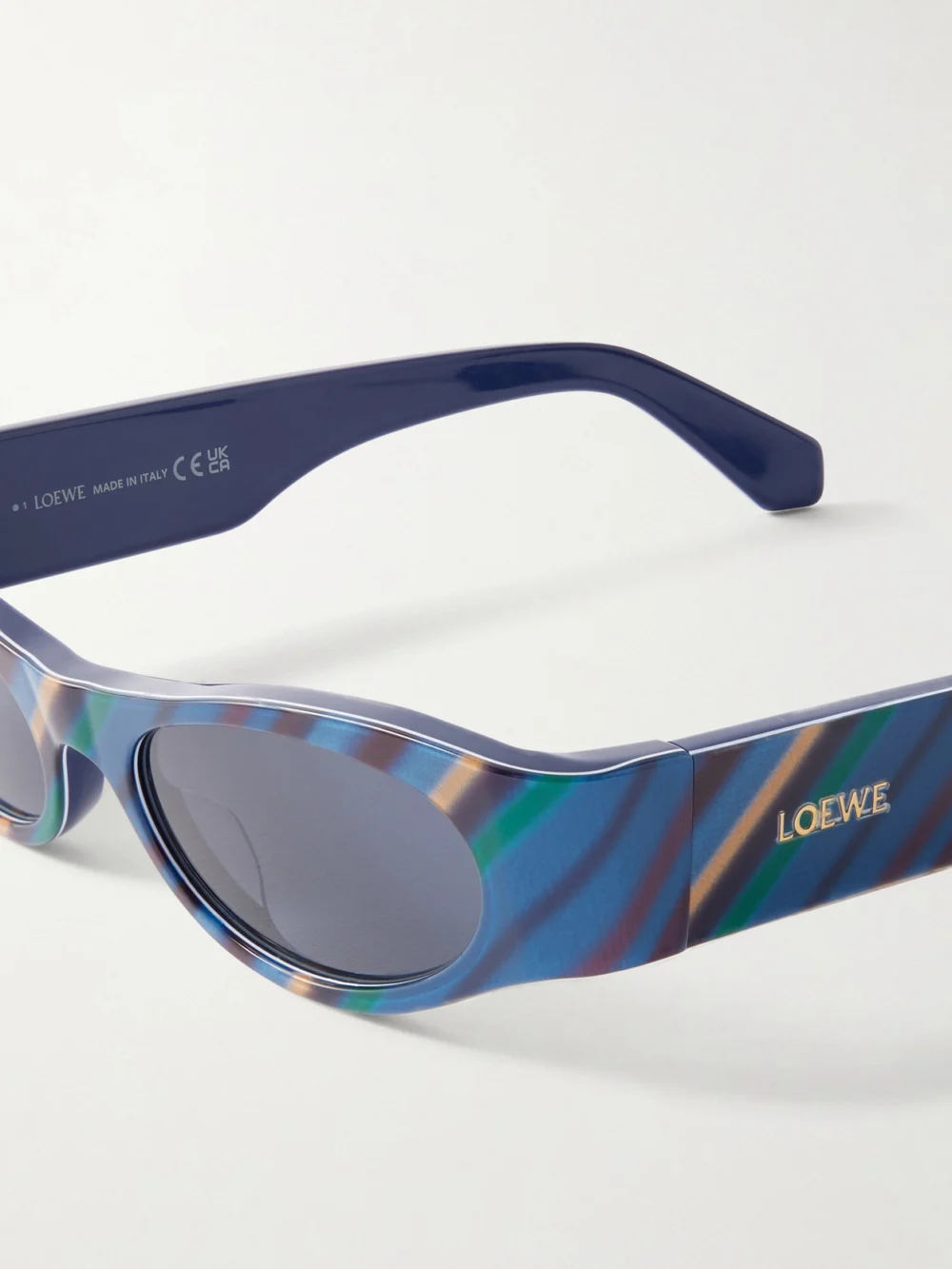 Close-up detail of the Loewe + Paula's Ibiza D-frame Striped Acetate Sunglasses